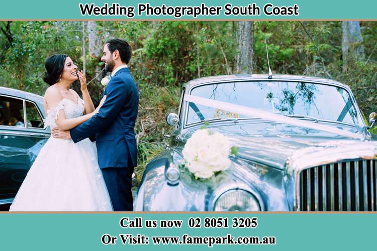 The Bride And The Groom Beside Their Bridal Car South Coast